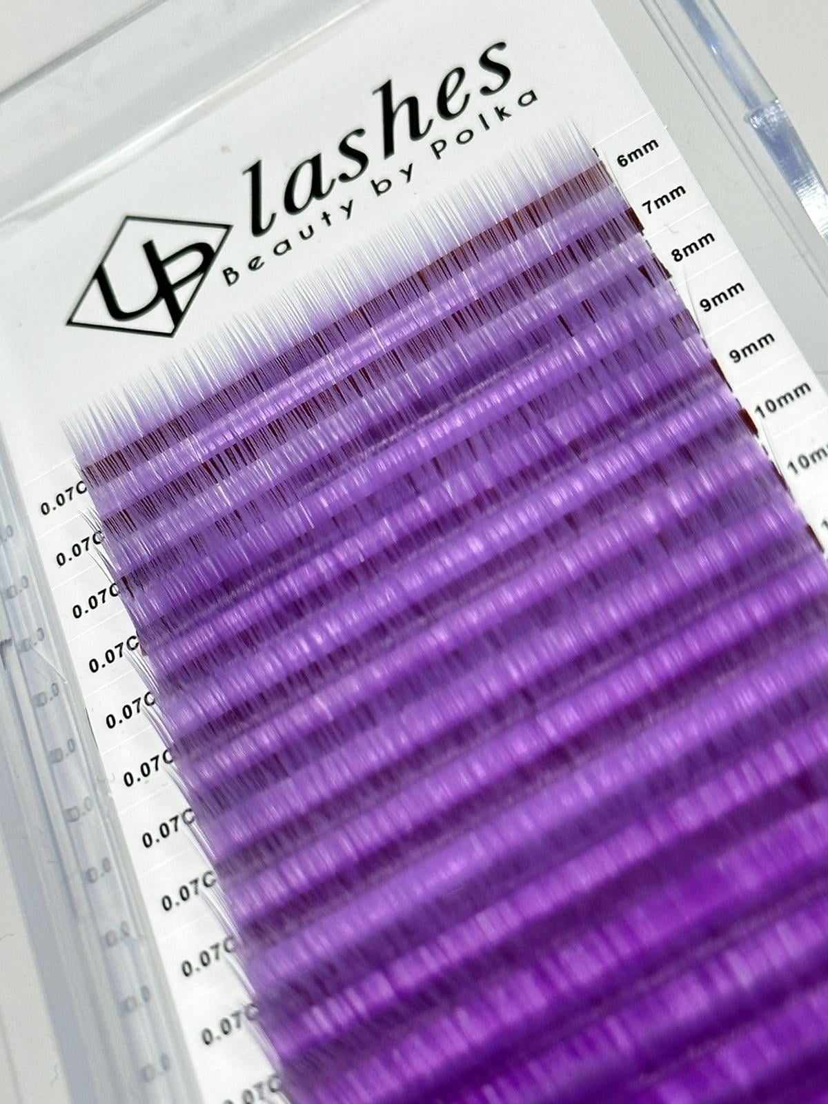 Purple eyelash extensions by Beauty by Polka in clear plastic tray