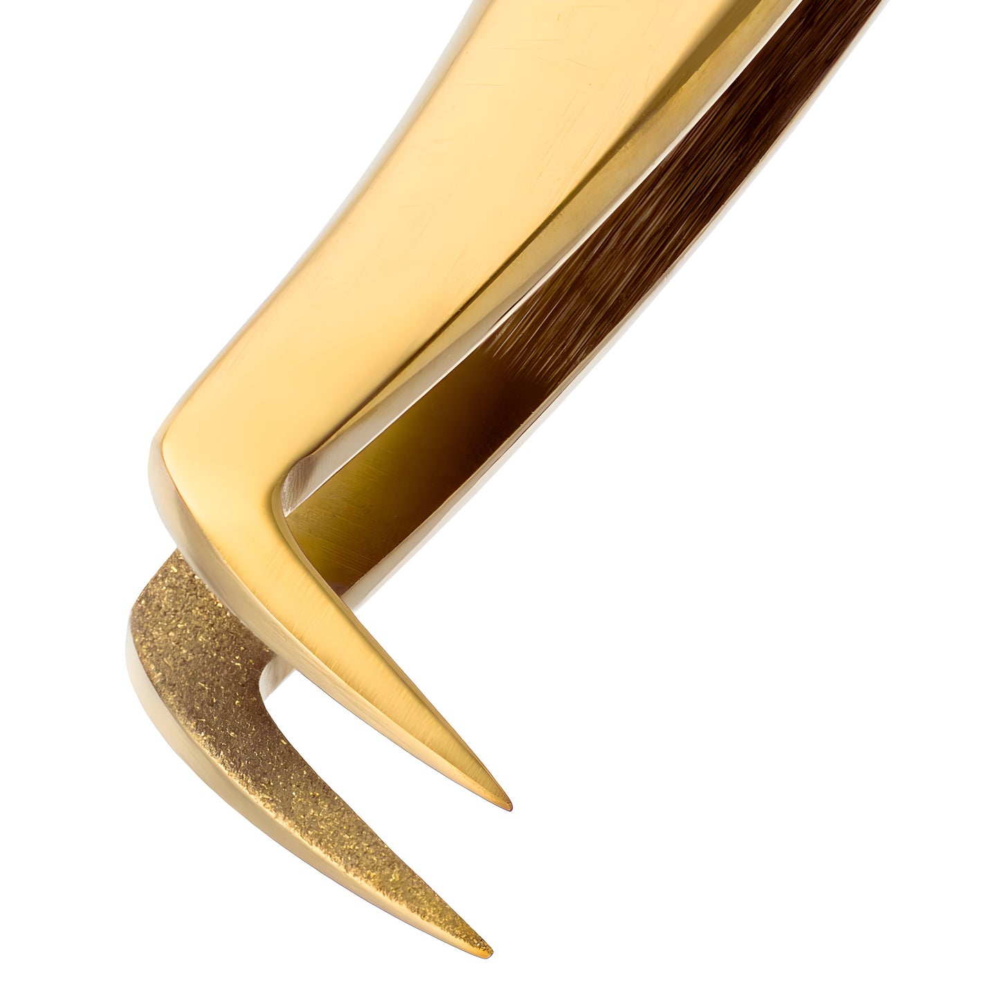 Close-up of a gold lash tweezer for eyelash extension application