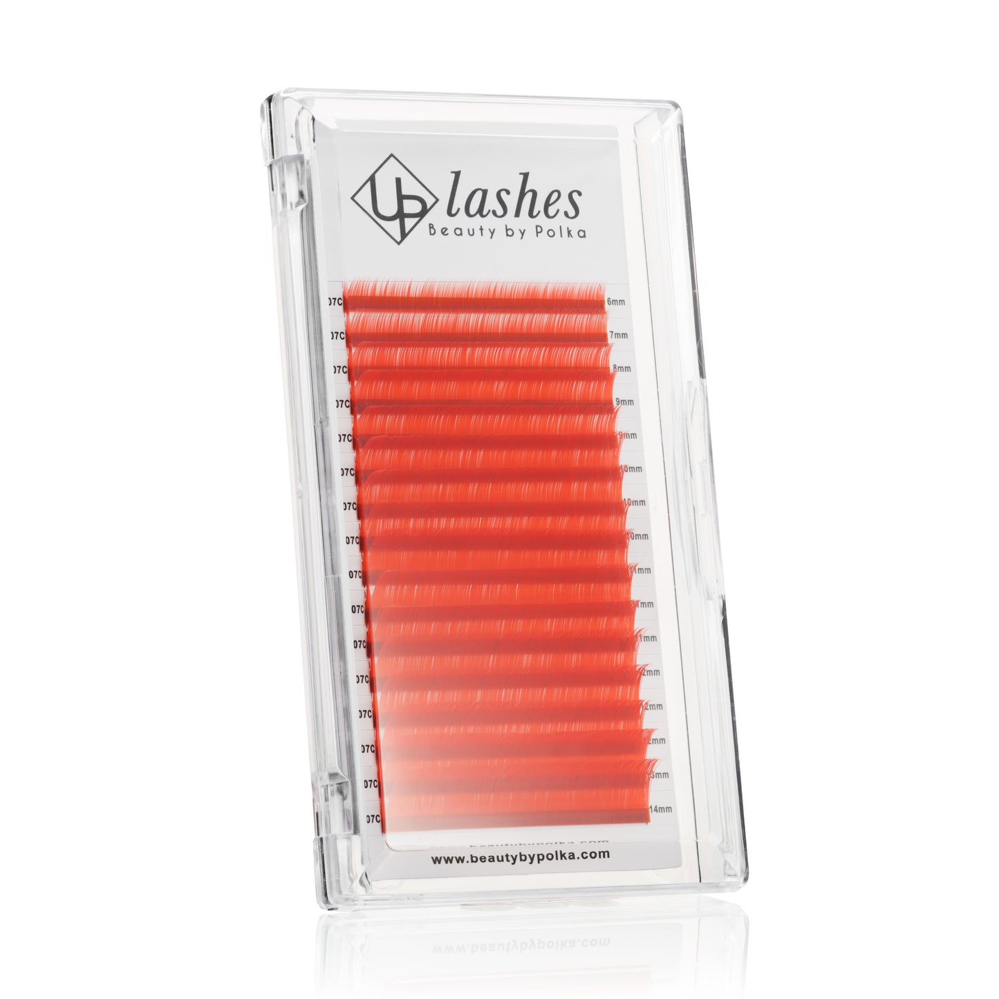 Close-up of C-curl red false lashes in a lash packaging box