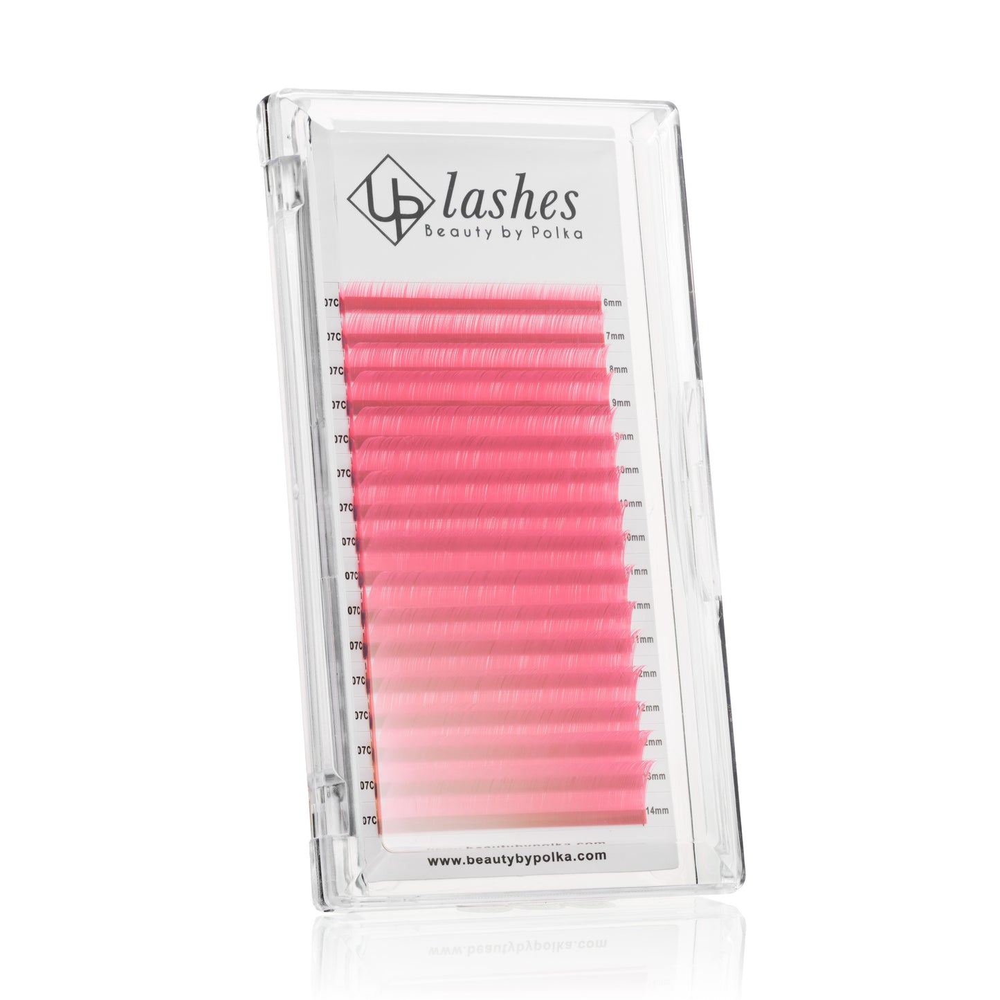 Close-up of colorful pink false lashes in a lash extension box.