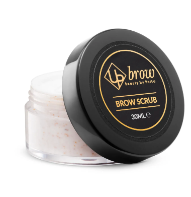 A jar of UPBrow Brow Scrub with the lid off, showing the product inside. The jar has a black lid with the brand logo and text 'BROW' on the top.