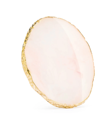 An irregular oval-shaped resin stone with a gold-like rim, used as a glue holder for eyelash extension procedures.