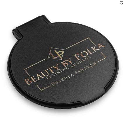 A black pocket mirror with the text 'BEAUTY BY POLKA' printed on the lid.