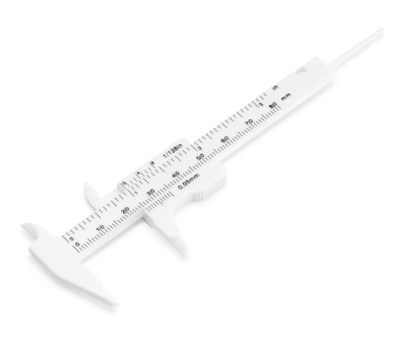 A white eyebrow geometry caliper with black measurement markings, used for measuring distances on eyebrows before shaping or coloring.