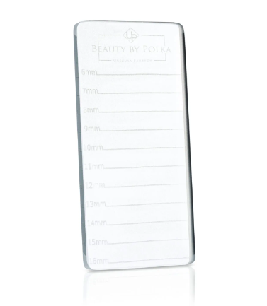 A rectangular glass lash holder with length markings, branded 'Beauty by Polka'.