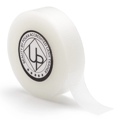 A roll of Transpore tape with a label indicating 'Beauty by Polka Accredited', predominantly white in color.