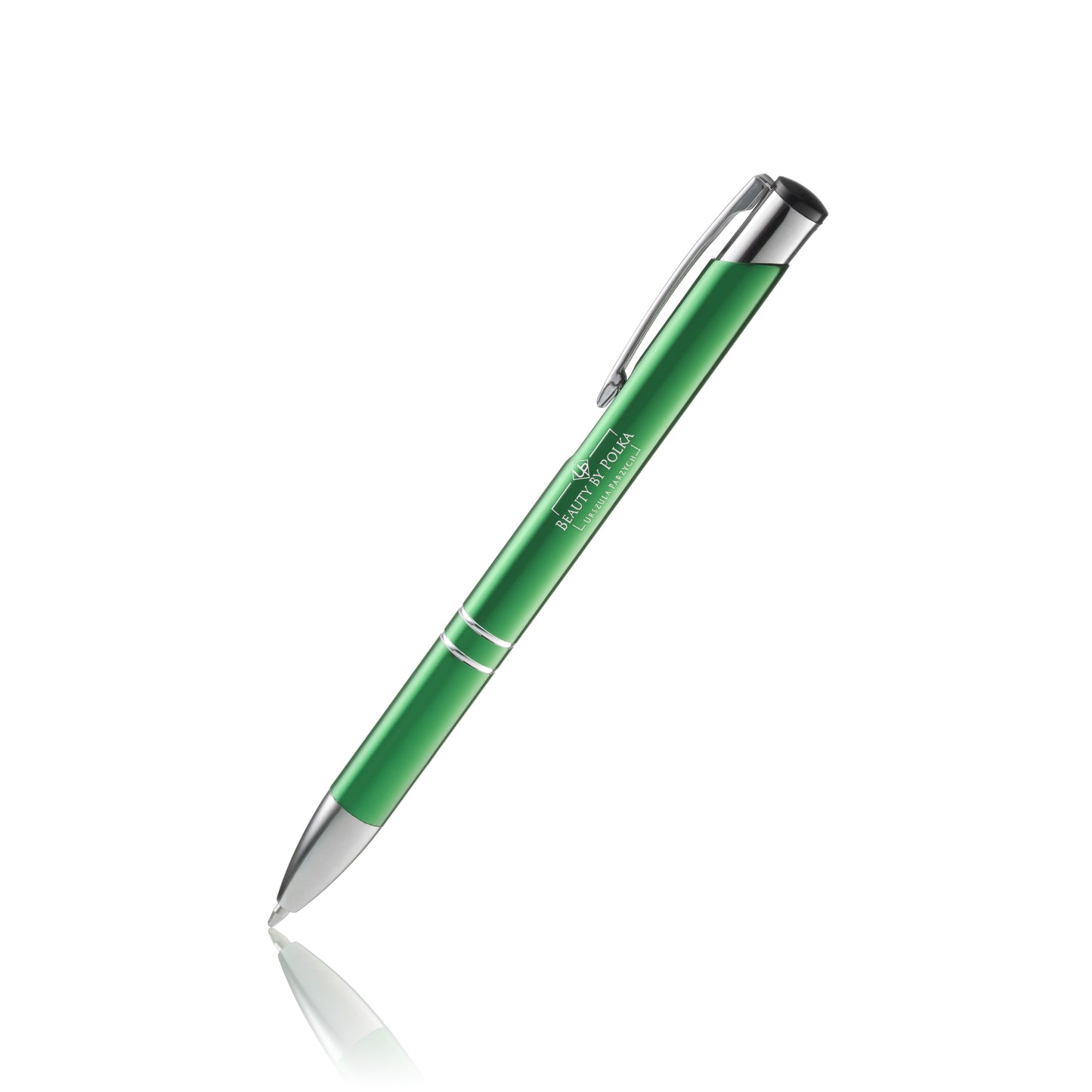 An engraved metal pen with a green lacquered coating, silver accents, and a metal clip. The pen's model name is 'Beauty by Polka'.