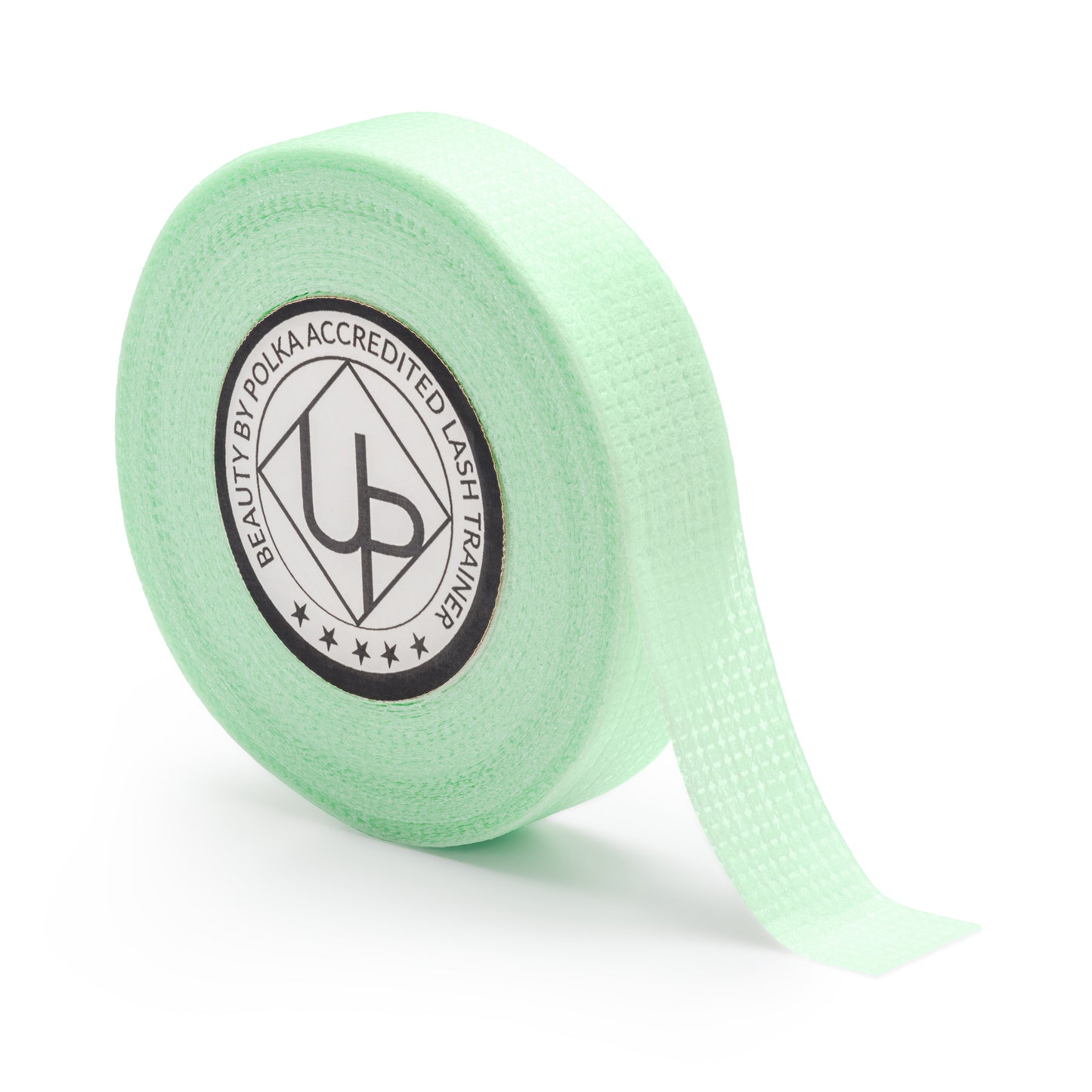 Perforated green tape for securing lower lashes during eyelash treatments.